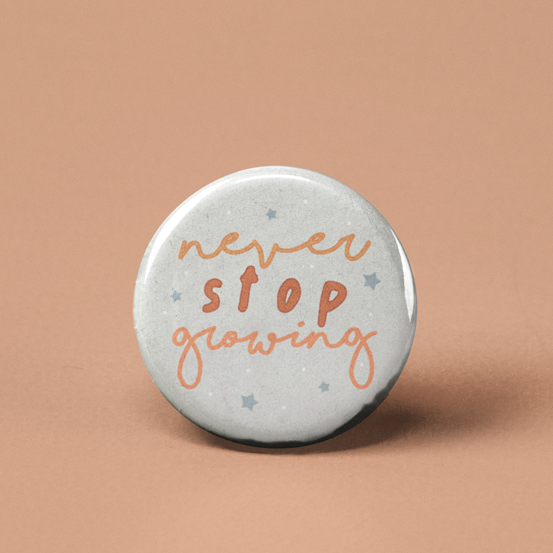 Never Stop Growing Pinback Button